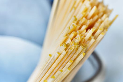 Dried pasta spaghetti in pan   , preparing food , traditional italian food