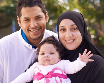 Muslim family, park and portrait of parents with baby for bonding, smile and outdoors together. Islam, happy and mother, father and newborn infant for love, childcare or support in garden.