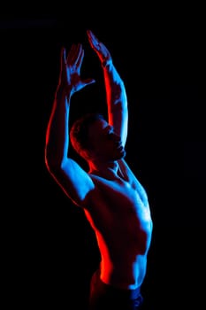 Portrait of man, bodybuilder and bicep flex in a studio, background and exercise for muscular power.