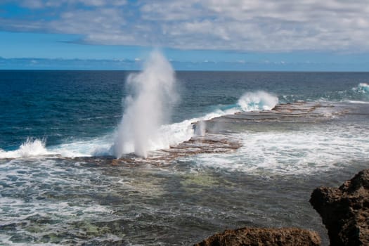 Tonga Blow Holes sea wave going in underwater reef caves and blowing