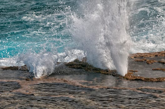 Tonga Blow Holes sea wave going in underwater reef caves and blowing