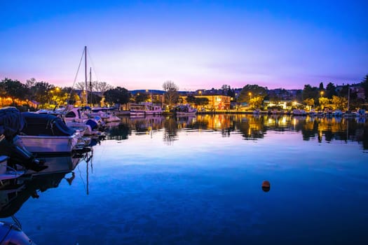 Colorful dusk harbor view in town of Krk, archipelago of Kvarner bay in Croatia