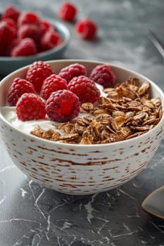 a bowl of yogurt and berries on the table. The concept of healthy food.