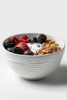 a bowl of yogurt and berries on the table. The concept of healthy food.