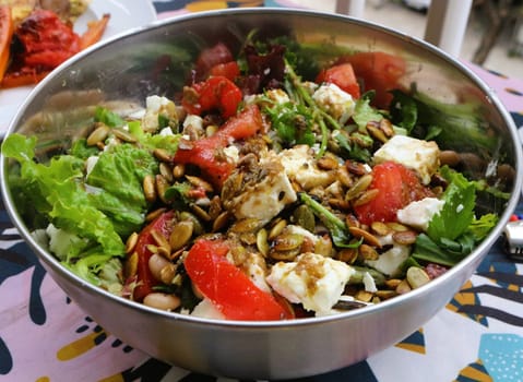 Experience the vibrant flavors and health benefits of a Greek style salad with feta