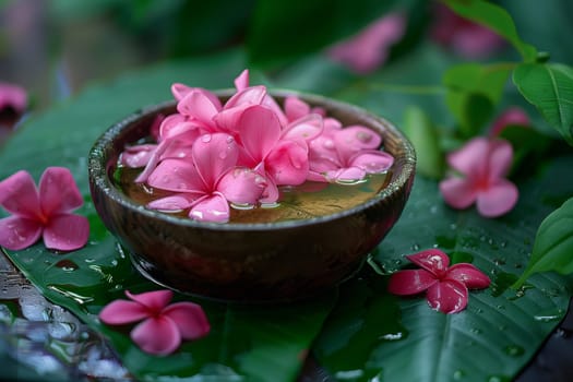 A ceramic bowl filled with clear water, encircled by vibrant pink flowers in full bloom.