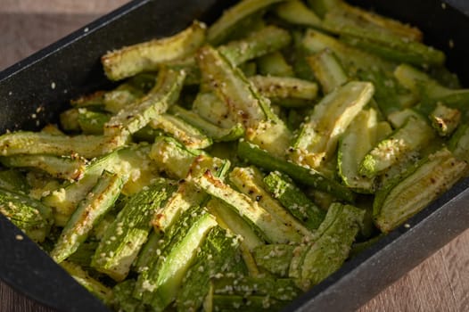 zucchini baked in the oven on a wooden table 2