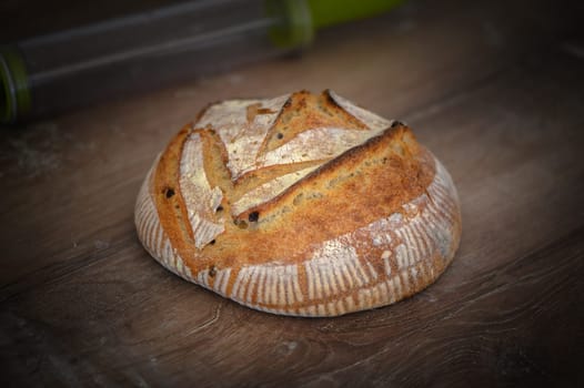 Fresh homemade sourdough bread with whole grain flour on a gray-blue background. Healthy food.3