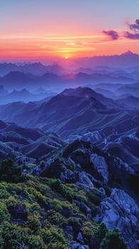 Layers of mountain ranges at sunset, offering a serene and majestic landscape.