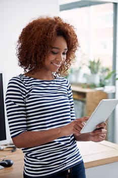 Creative, office and black woman with tablet for online research or communication on email. Professional, employee and scroll information on internet or reading news about business on website.