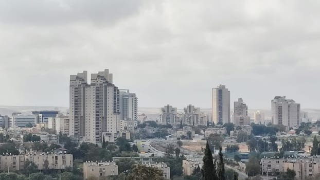 City top view, landscape blue gray light sky nature white clouds whether background . High quality photo