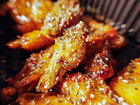 Korean Chicken wings with sauce. 치킨. Traditional oriental food.
