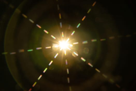 Abstract sun flare. The lens flare is subject to digital correction.