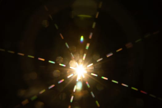 Abstract sun flare. The lens flare is subject to digital correction.