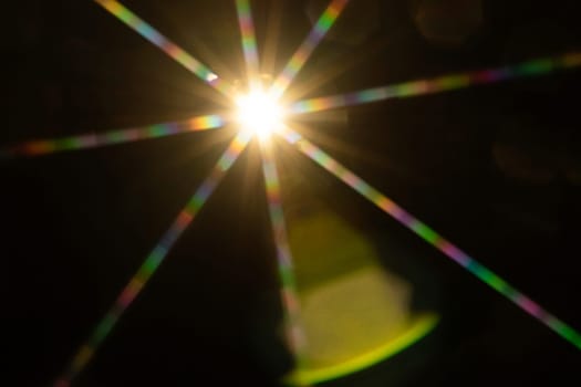 Abstract sun flare. The lens flare is subject to digital correction.