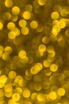 Abstract christmas lights glitter background. christmas gold texture background.