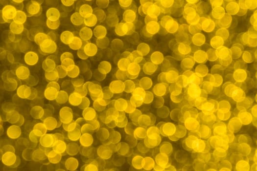 Abstract christmas lights glitter background. christmas gold texture background.