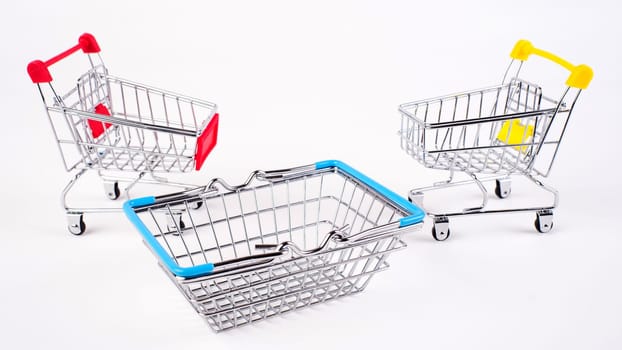 Empty grocery shopping cart. Isolated over white background.