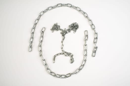 Sad face made of metal chain on a white background.