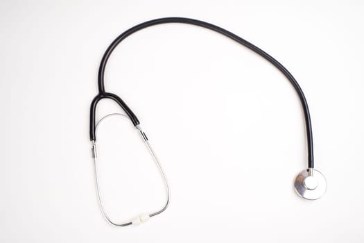 Stethoscope isolated on white, top view. Medical tool.