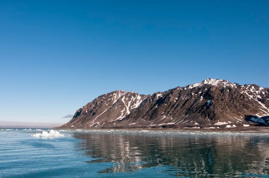 Svalbard Spitzbergen Islands Glacier view with small iceberg