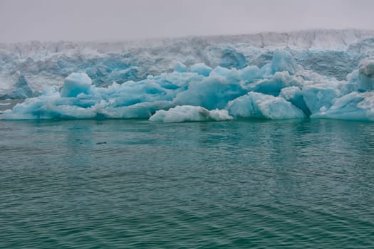 Svalbard Spitzbergen Islands Glacier view with small iceberg