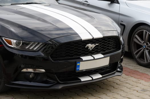 Gaziveren Cyprus 14/03/2024 - black and white Ford Mustang front view 1