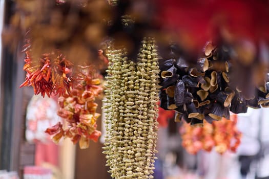 Dried marzipan hangs in a shop located on traditional Turkish streets.