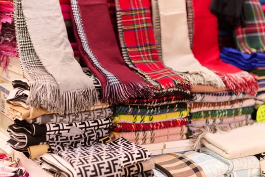 A kaleidoscope of traditional Muslim garments displayed at an Istanbul market reflects the rich cultural heritage of the city.