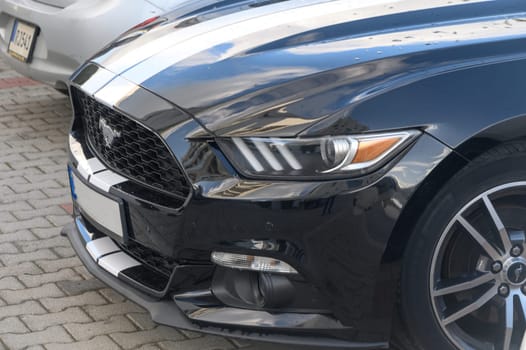 Gaziveren Cyprus 14/03/2024 - black and white Ford Mustang front and side views 2