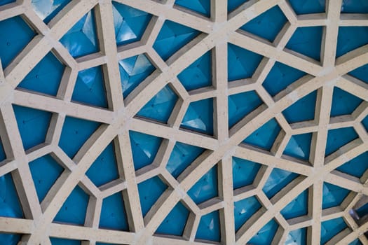 Architectural detail texture background with oriental hexagonal grid pattern.
