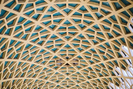 Architectural detail texture background with oriental hexagonal grid pattern.