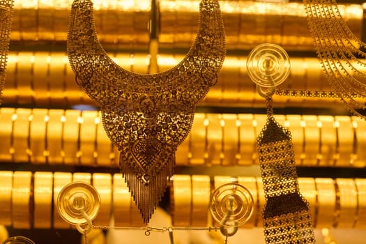 Golden Splendor, Exquisite handcrafted gold jewelry displayed in the bustling streets and traditional workshops of Istanbul.