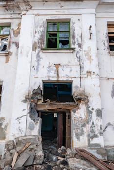 Post-war landscape. Destroyed building. War ruins. Destroyed city after the bombing. Dead city. Bombed buildings. Debris buildings. War destruction.