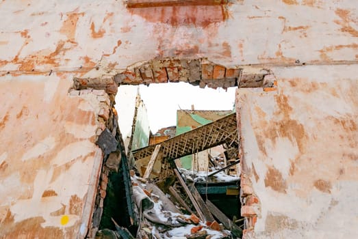 Post-war landscape. Destroyed building. War ruins. Destroyed city after the bombing. Dead city. Bombed buildings. Debris buildings. War destruction.