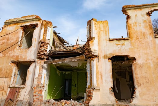 Post-war landscape. Destroyed building. War ruins. Destroyed city after the bombing. Dead city. Bombed buildings. Debris buildings. War destruction.