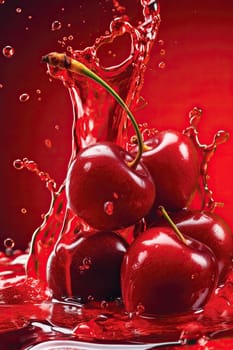 Fresh Cherry With Drops And Splashes Of Juice On A Red Background