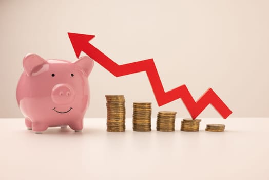 piggy bank, red up arrow and stacks of gold coins isolated on white background.