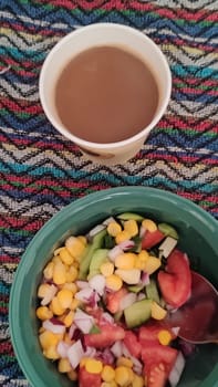 fresh vegetable salad and glass of coffee, breakfast food. High quality photo
