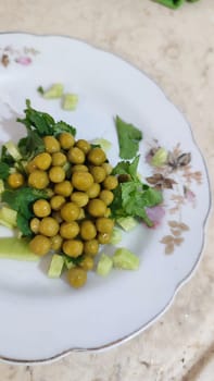 green peas and cucumber, salad food on a plate, breakfast. High quality photo