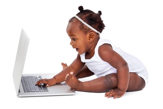 African baby in studio with laptop on white background for learning, development or growth or milestones with computer. Girl, backdrop or technology, curious or childhood education or formation.