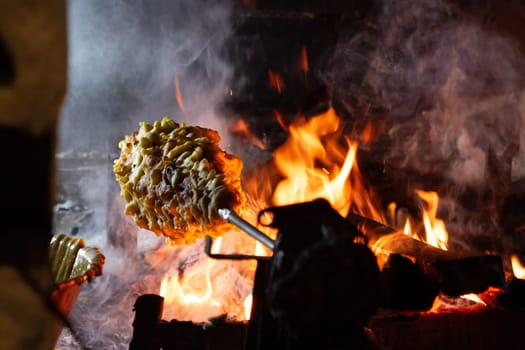 Wood-fired spit-roasted cake, Pyrenees-Atlantique, France. High quality photo