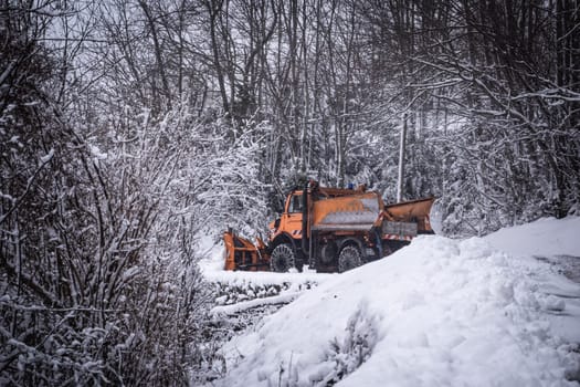 Snow removal by snow plow machine, Machinery snow removal, Pyrenees, France, High quality photo