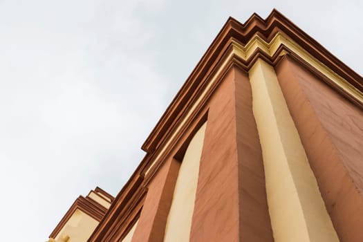 Shot of the facade of an old building after rain