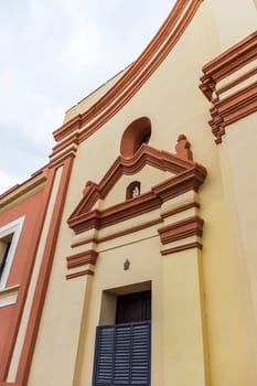 Shot of the facade of an old building after rain