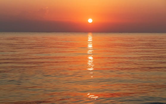 Shot of the dramatic sunrise by the sea.