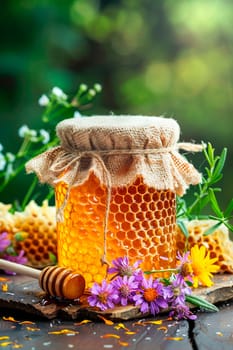 honey in a jar in the garden. selective focus. nature.