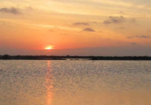 Shot of the beautiful sunset by the lake