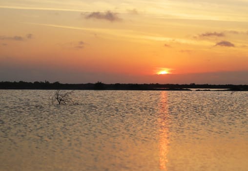 Shot of the beautiful sunset by the lake