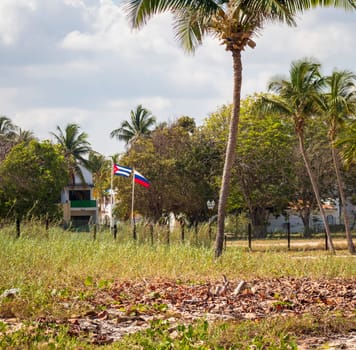 Shot of the Russian and Cuban flags floating on the wind